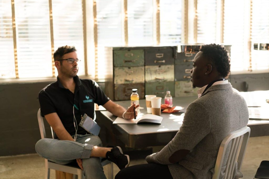 Employee sitting calmly, symbolizing a respectful resignation talk