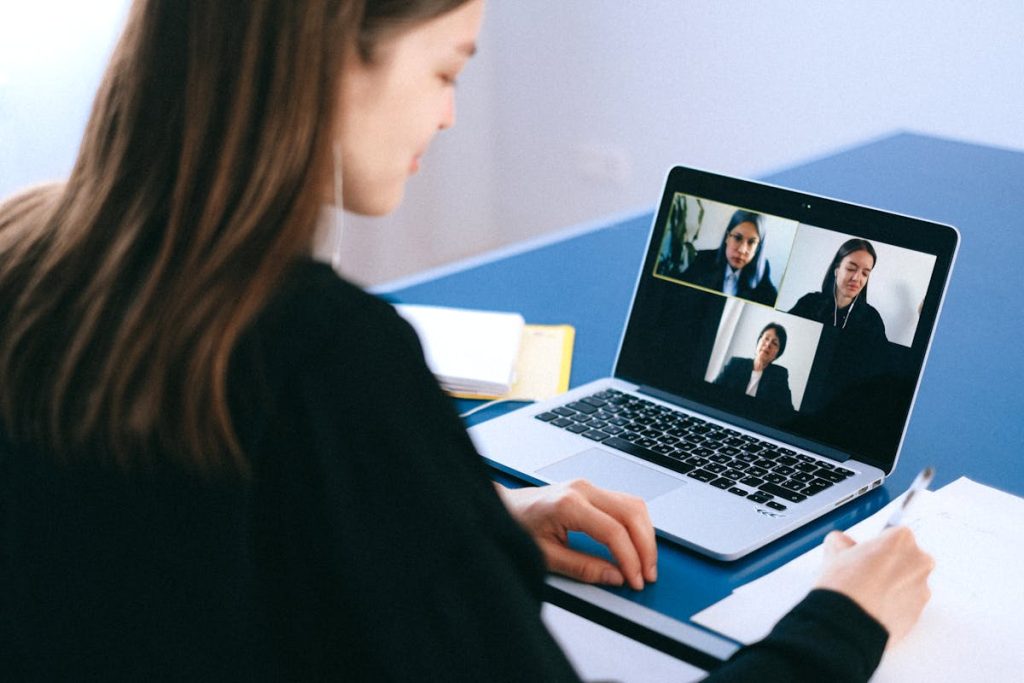 Online meeting representing collaboration in building passive income through digital products