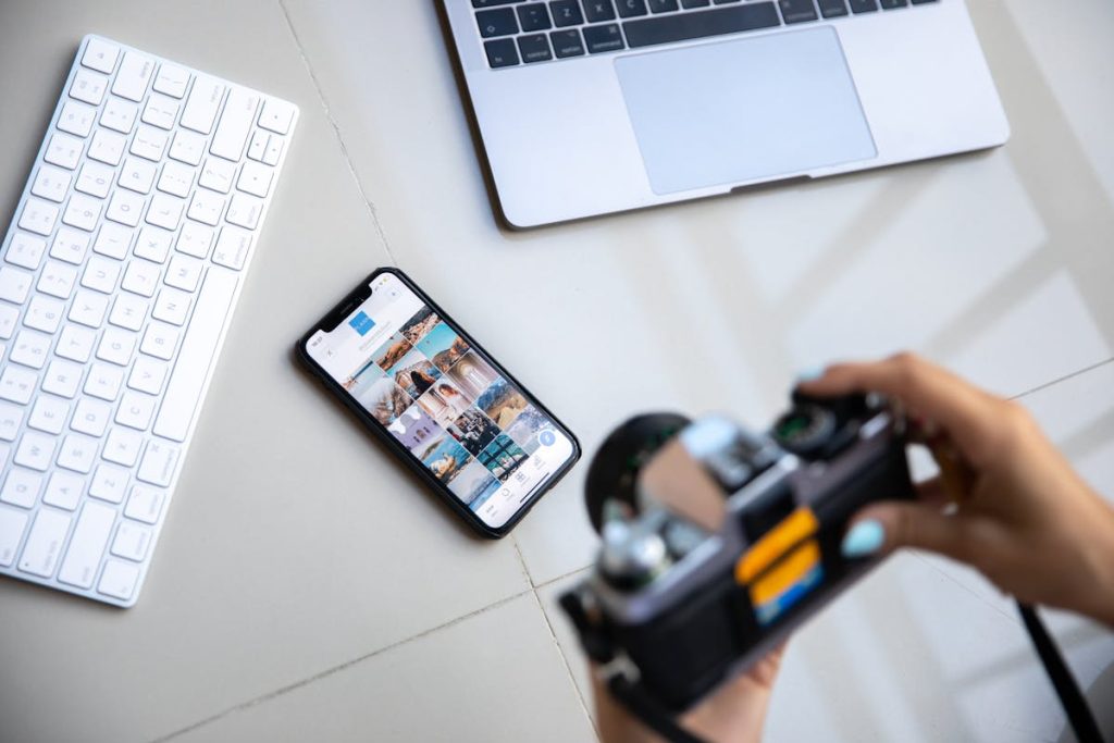 A person taking photo of portfolio on mobile