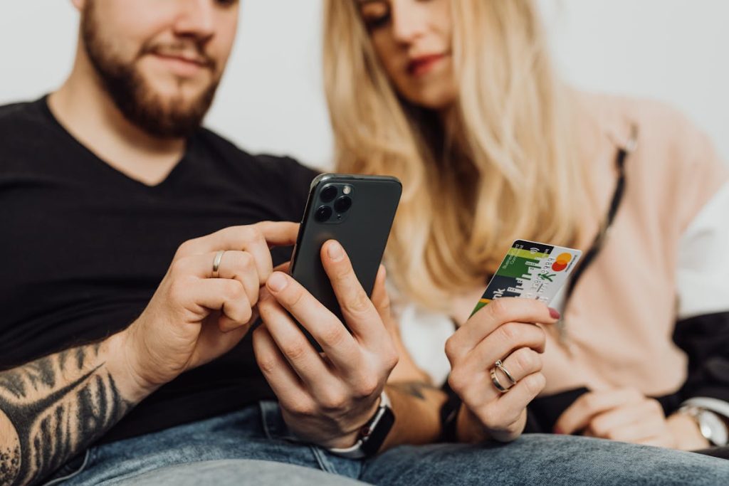Couple using e-commerce website for online shopping