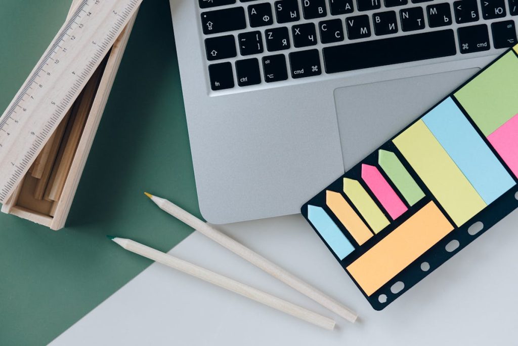 Creative setup with laptop and pen for digital decluttering visuals