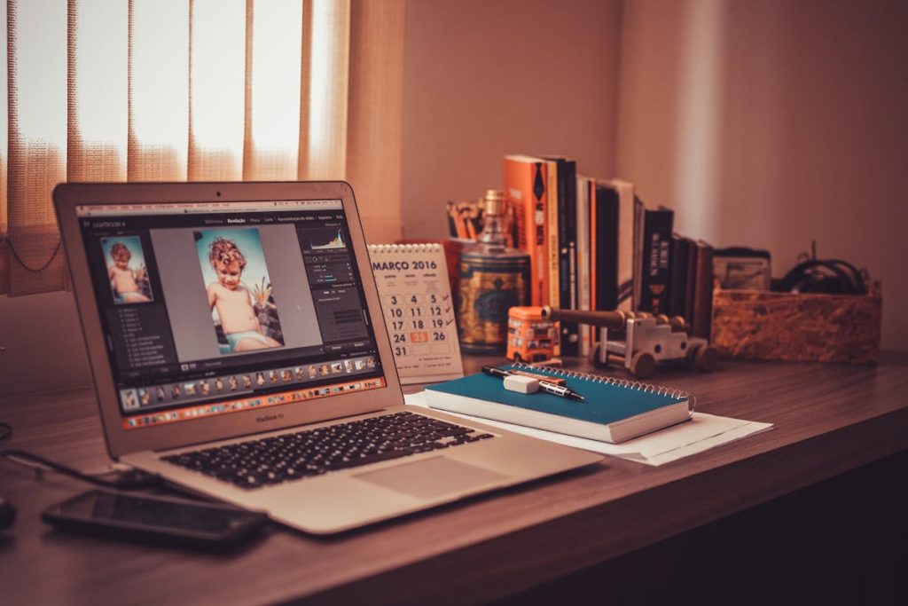 An open laptop with an editing software on screen