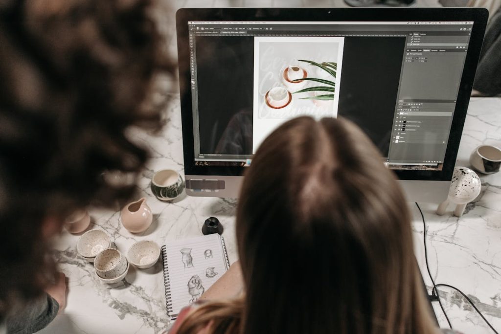 Person editing a photo using a computer